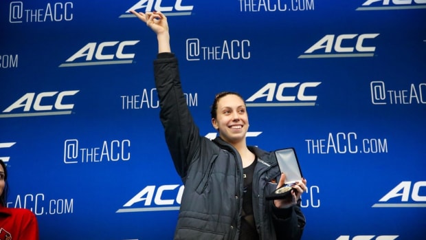Gretchen Walsh celebrates after winning the ACC title and setting an American record in the 100-yard butterfly at the 2024 ACC Swimming & Diving Championships in Greensboro.