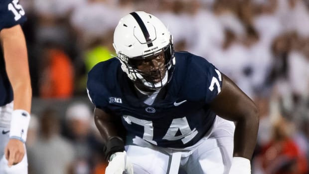 Penn State left tackle Olu Fashanu (74) gets set before a play against West Virginia at Beaver Stadium September 2, 2023, in State College.