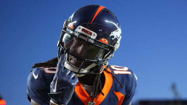 Caption: Dec 11, 2022; Denver, Colorado, USA; Denver Broncos wide receiver Jerry Jeudy (10) reacts to his third touchdown reception of the game in the fourth quarter against the Kansas City Chiefs at Empower Field at Mile High. Mandatory Credit: Ron Chenoy-USA TODAY Sports