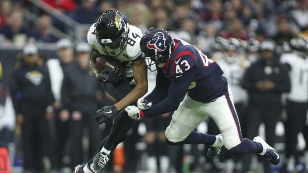 Dec 30, 2018; Houston, TX, USA; Jacksonville Jaguars wide receiver Keelan Cole (84) makes a reception as Houston Texans defensive back Shareece Wright (43) defends during the third quarter at NRG Stadium.