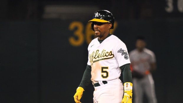Sep 22, 2023; Oakland, California, USA; Oakland Athletics left fielder Tony Kemp (5) walks off an injury during the sixth inning against the Detroit Tigers at Oakland-Alameda County Coliseum. Mandatory Credit: Kelley L Cox-USA TODAY Sports  