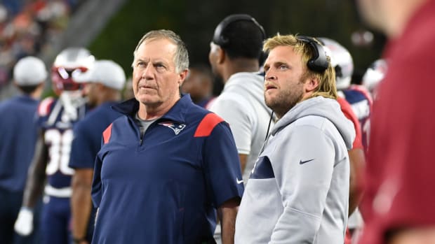 Bill Belichick with his son, New England Patriots assistant Steve Belichick, during a 2022 game.