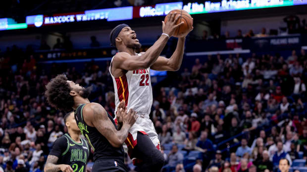 Miami Heat forward Jimmy Butler drives to the basket during a game against the New Orleans Pelicans.