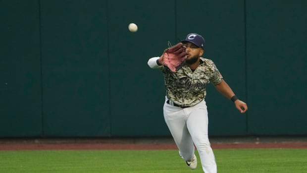Jun 28, 2023; Columbus, Ohio, USA; Columbus Clippers right fielder George Valera (13) catches a ball during the MiLB baseball game against the Toledo Mud Hens at Huntington Park.
