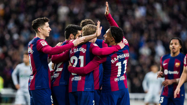 Barcelona players pictured celebrating a goal during a 4-0 win over Getafe in La Liga in February 2024