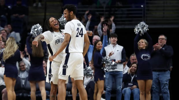 Penn State's Ace Baldwin Jr. and Zach Hicks celebrate during the Nittany Lions' win over Indiana in a Big Ten men's basketball game at Rec Hall.