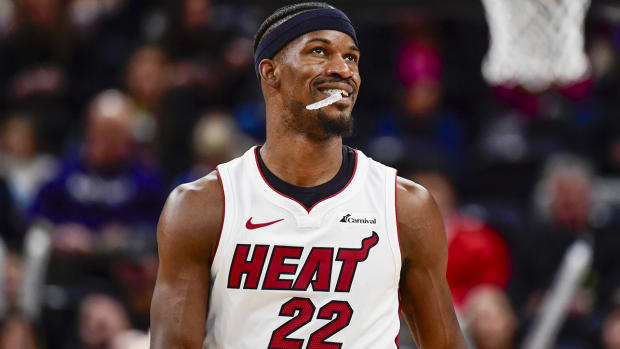 Jimmy Butler looks on during a Heat game.