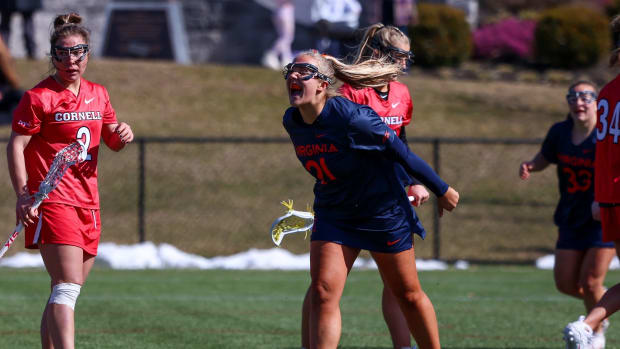 Kate Miller celebrates after scoring a goal during the Virginia women's lacrosse game against Cornell at Tierney Field at the USA Lacrosse Headquarters in Sparks, Maryland.