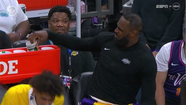 LeBron James reacts to a play on the Lakers’ bench.