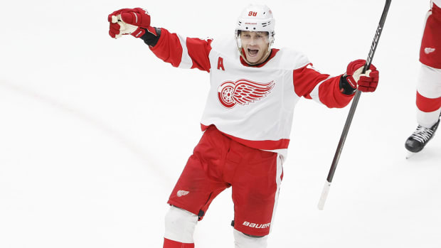 Red Wings right wing Patrick Kane celebrates after scoring a game-winning goal.