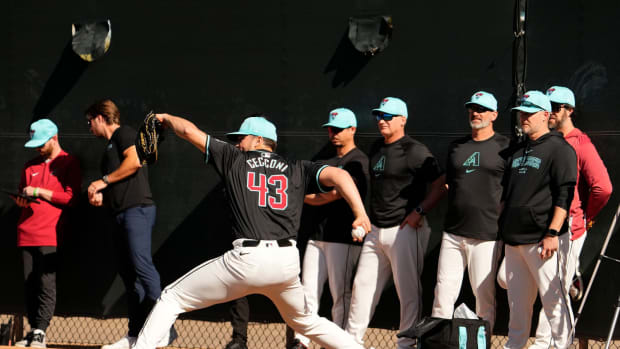 Slade Cecconi throws a bullpen session at Salt River Fields