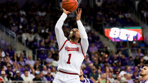 Feb 24, 2024; Fort Worth, Texas, USA; Cincinnati Bearcats guard Day Day Thomas (1) shoots during the second half against the TCU Horned Frogs at Ed and Rae Schollmaier Arena. Mandatory Credit: Kevin Jairaj-USA TODAY Sports