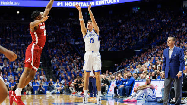 Feb 24, 2024; Lexington, Kentucky, USA; Kentucky Wildcats guard Reed Sheppard (15) makes a three point basket during the second half against the Alabama Crimson Tide at Rupp Arena at Central Bank Center. Mandatory Credit: Jordan Prather-USA TODAY Sports
