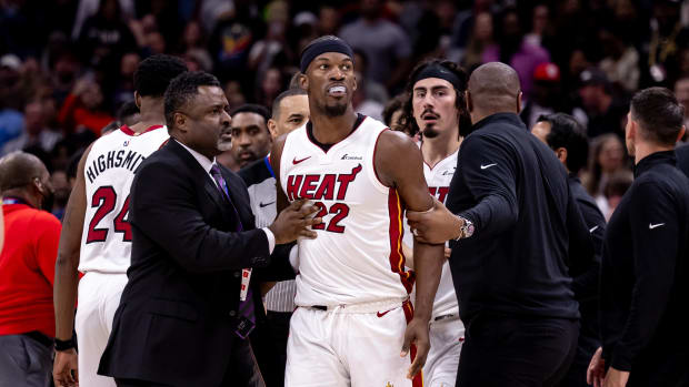 Feb 23, 2024; New Orleans, Louisiana, USA; Miami Heat forward Jimmy Butler (22) and New Orleans Pelicans forward Naji Marshall (8) and guard Jose Alvarado (15) are ejected after a melee due to a play during the second half at Smoothie King Center. Mandatory Credit: Stephen Lew-USA TODAY Sports  