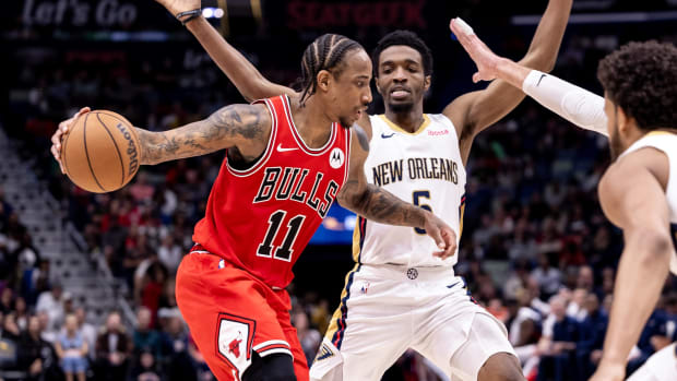 Chicago Bulls forward DeMar DeRozan (11) looks to pass the ball against New Orleans Pelicans forward Herbert Jones (5) during the second half at Smoothie King Center. 