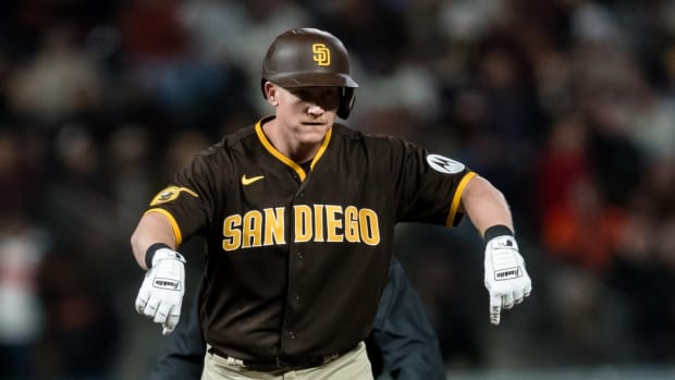 Sep 27, 2023; San Francisco, California, USA; San Diego Padres first baseman Garrett Cooper (24) gestures after he hit a double against the San Francisco Giants during the ninth inning at Oracle Park