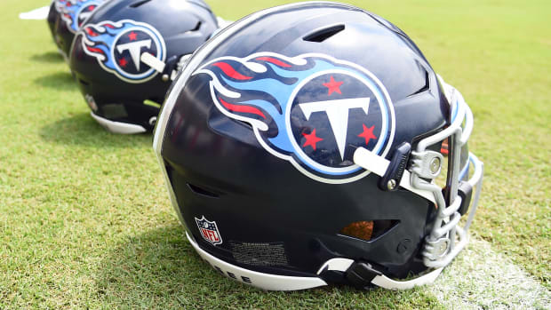 View of helmets on the field as Tennessee Titans players finish training camp practice.
