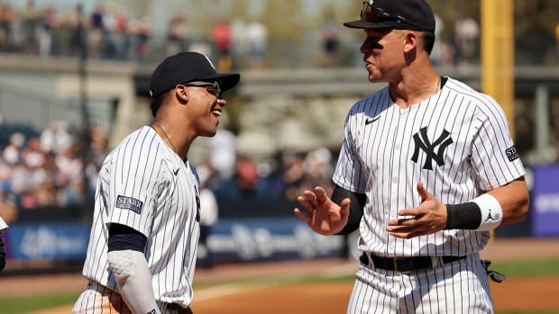 New York Yankees outfielders Juan Soto and Aaron Judge share a laugh prior to their game against the Toronto Blue Jays on Sunday in Tampa.
