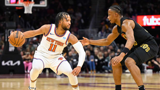 Oct 31, 2023; Cleveland, Ohio, USA; Cleveland Cavaliers forward Isaac Okoro (35) defends New York Knicks guard Jalen Brunson (11) in the second quarter at Rocket Mortgage FieldHouse.