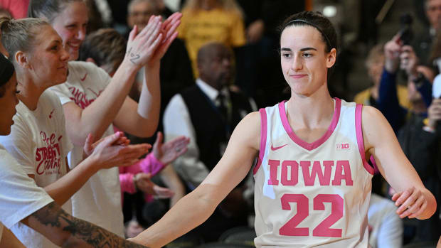 Iowa guard Caitlin Clark (22) is introduced before the game against Illinois at Carver-Hawkeye Arena.
