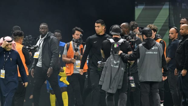 Feb 1, 2024; Riyadh, Saudi Arabia; Al-Nassr forward Cristiano Ronaldo (7) walks on the field before the game against Inter Miami CF at Kingdom Arena.