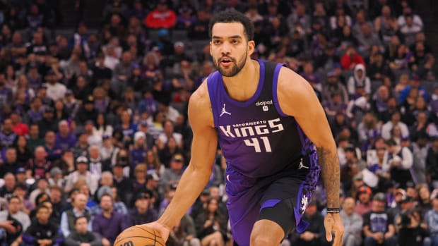 Jan 2, 2024; Sacramento, California, USA; Sacramento Kings forward Trey Lyles (41) controls the ball against the Charlotte Hornets during the first quarter at Golden 1 Center. Mandatory Credit: Kelley L Cox-USA TODAY Sports