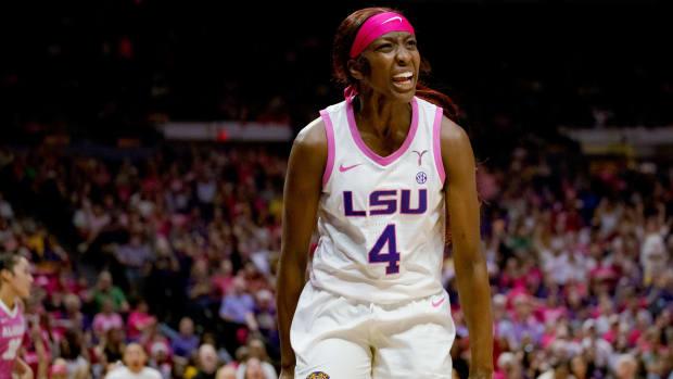 Feb 11, 2024; Baton Rouge, Louisiana, USA; LSU Lady Tigers guard Flau'jae Johnson (4) celebrates after making a basket and getting an extra foul shot against Alabama Crimson Tide guard Aaliyah Nye (not pictured) during the second half at Pete Maravich Assembly Center. 