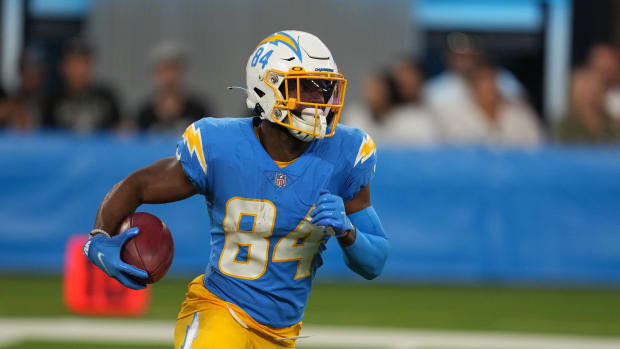 Oct 4, 2021; Inglewood, California, USA; Los Angeles Chargers wide receiver K.J. Hill (84) runs the ball against the Las Vegas Raiders during the first quarter at SoFi Stadium. Mandatory Credit: Kirby Lee-USA TODAY Sports  