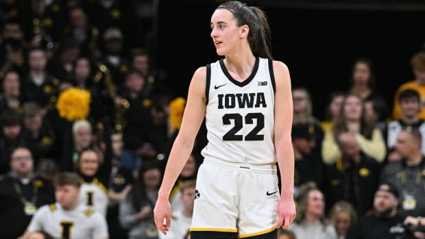 Iowa guard Caitlin Clark looks on during a game.