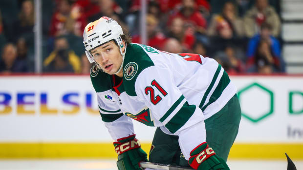 Dec 5, 2023; Calgary, Alberta, CAN; Minnesota Wild right wing Brandon Duhaime (21) against the Calgary Flames during the first period at Scotiabank Saddledome.