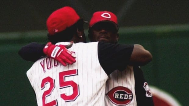 JULY 28, 2001: Dmitri Young and Pokey Reese hug in the outfield as the team was warming up to play the Florida Marlins at Cinergy Field . There is talk that one or both might be on the trade block Text 2001 0728 13 Ditphoto Reds 2 Cincinnati Reds Dmitri Young And Pokey Reese Hug In The Outfield As The Team Was Warming Up To Play The Florida Marlins At Cinergy Field There Is Talk That One Or Both Might Be On The Trade Block C E Photo By Ernest Coleman For Sports  