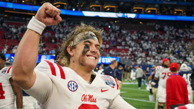 Dec 30, 2023; Atlanta, GA, USA; Mississippi Rebels quarterback Jaxson Dart (2) celebrates after a victory against the Penn State Nittany Lions in the Peach Bowl at Mercedes-Benz Stadium