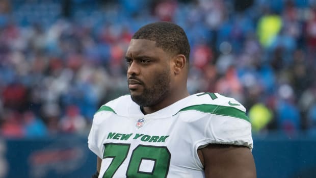 Dec 11, 2022; Orchard Park, New York, USA; New York Jets guard Laken Tomlinson (78) on the sidelines before a game against the Buffalo Bills at Highmark Stadium. Mandatory Credit: Mark Konezny-USA TODAY Sports