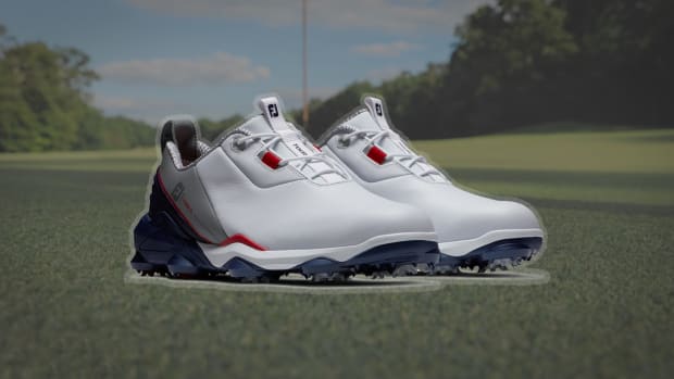 the footjoy tour alpha men's golf shoes, seen here in navy and white, are on sale at pga tour superstore