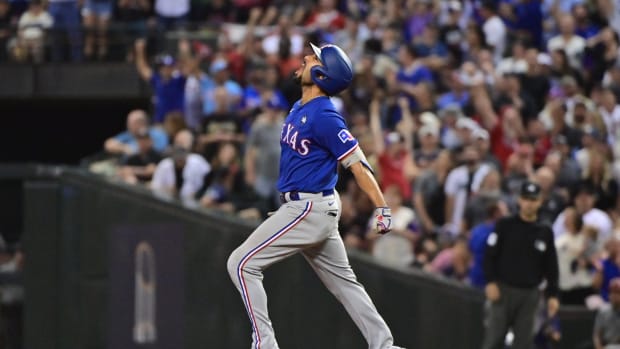 Texas Rangers second baseman Marcus Semien homered in his last at-bat in the World Series-clinching Game 5 win against the Arizona Diamondbacks on Nov. 1 in Phoenix. On Tuesday, he homered in his first at-bat against the Diamondbacks in a spring training game at Salt River Fields In Scottsdale, Ariz.
