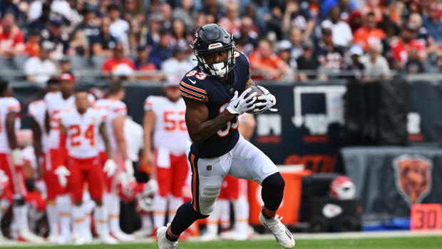 Aug 13, 2022; Chicago, Illinois, USA; Chicago Bears wide receiver Dazz Newsome (83) carries the ball against the Kansas City Chiefs at Soldier Field. Chicago defeated Kansas City 19-14. Mandatory Credit: Jamie Sabau-USA TODAY Sports  