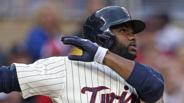 May 26, 2012; Minneapolis, MN, USA: Minnesota Twins center fielder Denard Span (2) hits a home run in the sixth inning against the Detroit Tigers at Target Field.