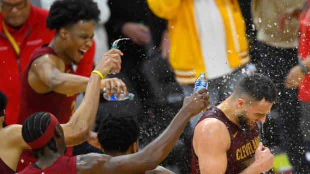 Feb 27, 2024; Cleveland, Ohio, USA; Cleveland Cavaliers guard Max Strus (1) is doused with water after hitting a last-second, game-winning three-point basket in the fourth quarter against the Dallas Mavericks at Rocket Mortgage FieldHouse.