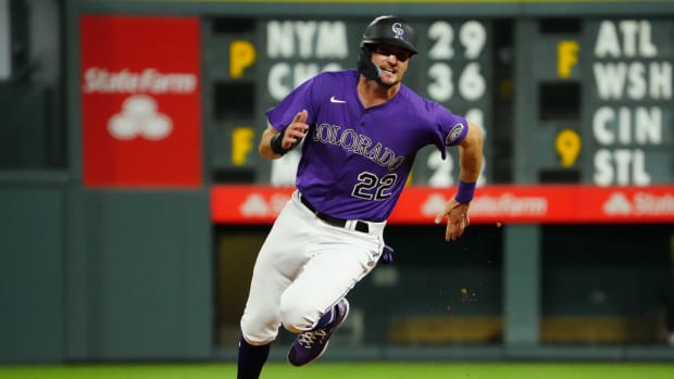 Jul 15, 2022; Denver, Colorado, USA Colorado Rockies center fielder Sam Hilliard (22) heads to third in the eighth inning against the Pittsburgh Pirates at Coors Field.