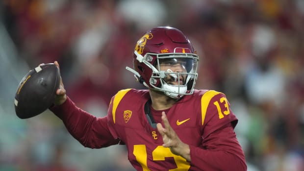 Oct 21, 2023; Los Angeles, California, USA;Southern California Trojans quarterback Caleb Williams (13) throws the ball against the Utah Utes in the first half at United Airlines Field at Los Angeles Memorial Coliseum. Mandatory Credit: Kirby Lee-USA TODAY Sports