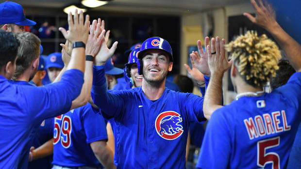 Jul 5, 2023; Milwaukee, Wisconsin, USA; Chicago Cubs center fielder Cody Bellinger (24) celebrates after tying the score against the Milwaukee Brewers in the ninth inning at American Family Field. Mandatory Credit: Michael McLoone-USA TODAY Sports