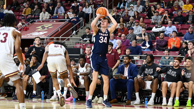 Virginia Cavaliers forward Jacob Groves (34) shoots the ball against the Boston College Eagles during the first half at Conte Forum.