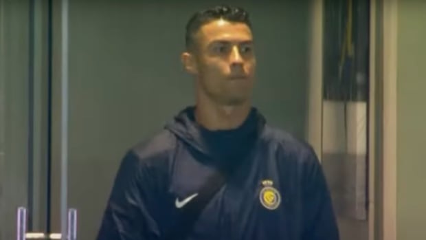 Cristiano Ronaldo pictured watching Al Nassr's 4-4 draw with Al-Hazm from an executive box at King Saud University Stadium in February 2024