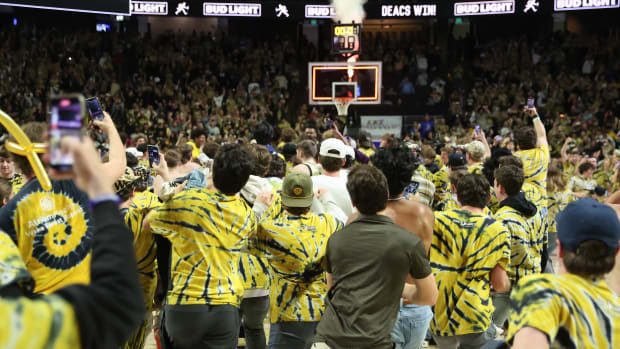 Wake Forest fans storm the court
