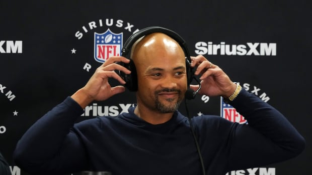 Feb 27, 2024; Indianapolis, IN, USA; Atlanta Falcons general manager Terry Fontenot on the SiriusXM radio set during the NFL Scouting Combine at Indiana Convention Center.