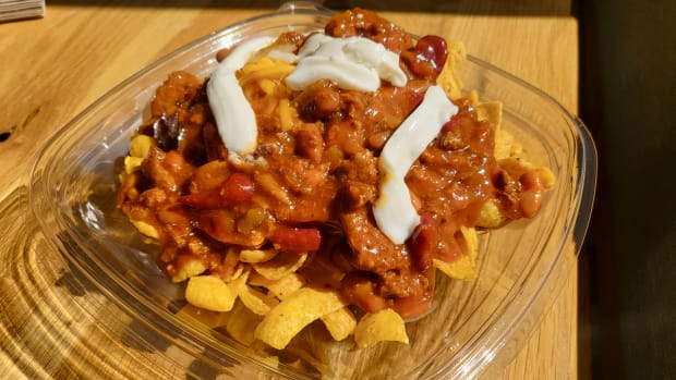 The chili con carne at Wendy's is Crowding the Plate's top choice for Frito pie. Wendy's offers cheddar cheese, sweet onions and sour cream as toppings, but you'll need to bring your own Fritos.