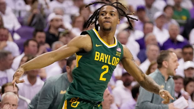 Feb 26, 2024; Fort Worth, Texas, USA; Baylor Bears guard Jayden Nunn (2) reacts after a three point basket against the TCU Horned Frogs during the second half at Ed and Rae Schollmaier Arena. Mandatory Credit: Raymond Carlin III-USA TODAY Sports  