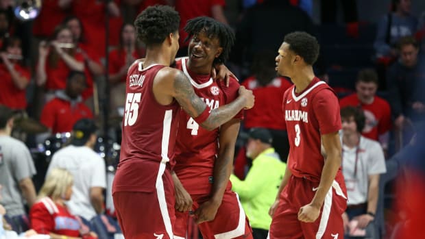 Feb 28, 2024; Oxford, Mississippi, USA; Alabama Crimson Tide guard Aaron Estrada (55), guard Davin Cosby Jr. (4) and guard Rylan Griffen (3) react after defeating the Mississippi Rebels at The Sandy and John Black Pavilion at Ole Miss. Mandatory Credit: Petre Thomas-USA TODAY Sports  