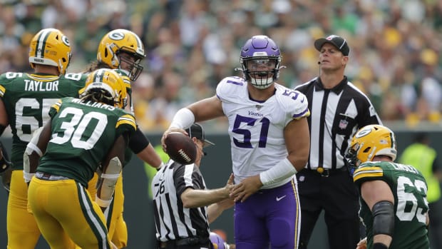 Minnesota Vikings defensive end Hercules Mata'afa (51) celebrates recovering a fumble by Green Bay Packers quarterback Aaron Rodgers (12) in the third quarter during their football game Sunday, September 15, 2019, at Lambeau Field in Green Bay, Wis. Apc Packvsvikings 0915191494djp  