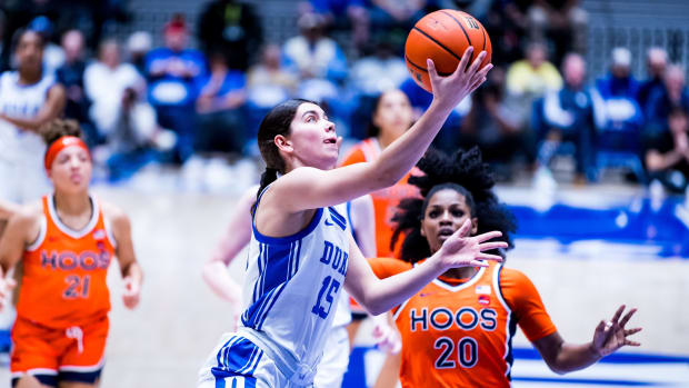Emma Koabel scores a layup during the Virginia women's basketball game against Duke at Cameron Indoor Stadium.